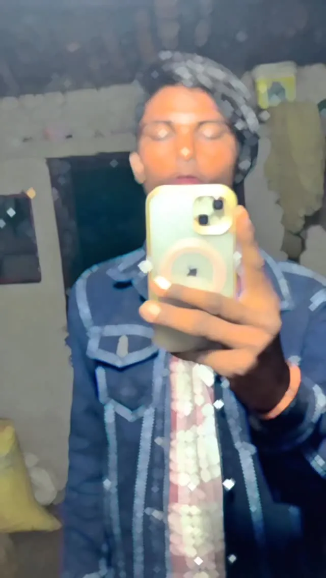 Close-up of Sanny Kashyap's face with minimal makeup and bright natural light smile