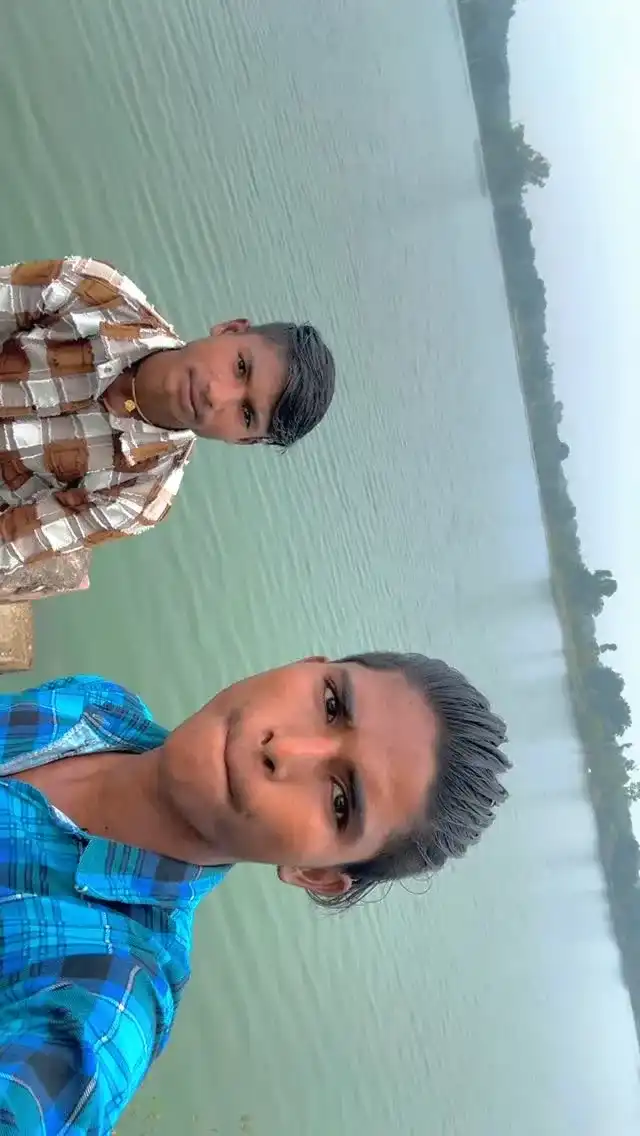 Sanny Kashyap posing gracefully in a stunning red dress fashion photo