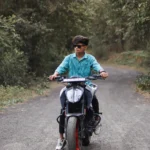 Smiling headshot in soft daylight