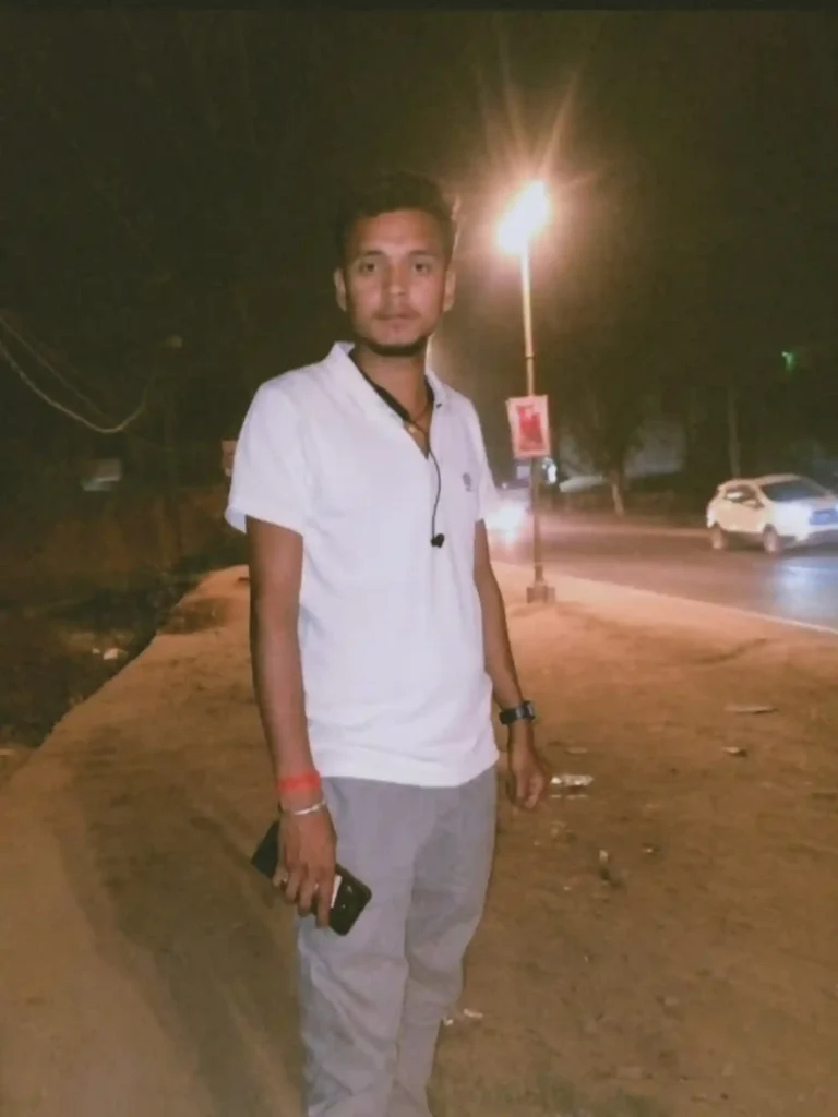 posing against city night lights