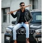 Digital content creator posing with a smartphone for a modern lifestyle shot