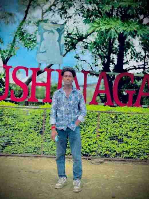 Ajay Kumar relaxing at luxury resort hotel outdoor pool