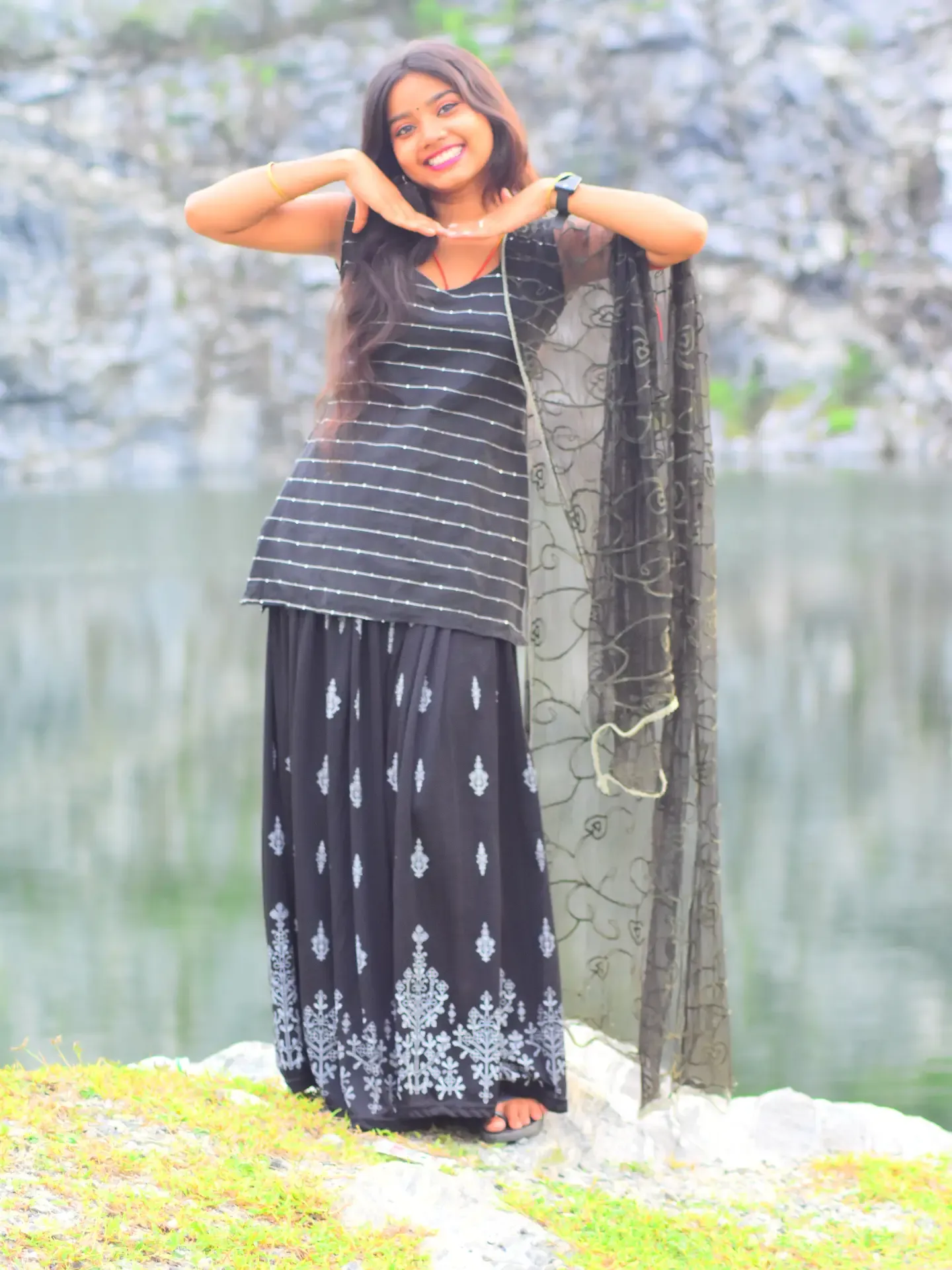 Anupama aesthetic outdoor fashion portrait in traditional black suit