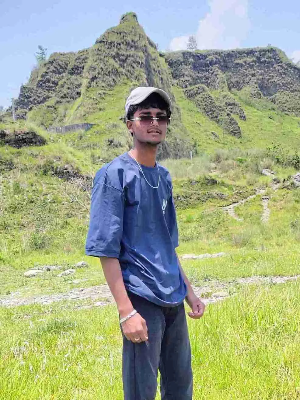 Candid moment of Rayeen laughing naturally outdoors