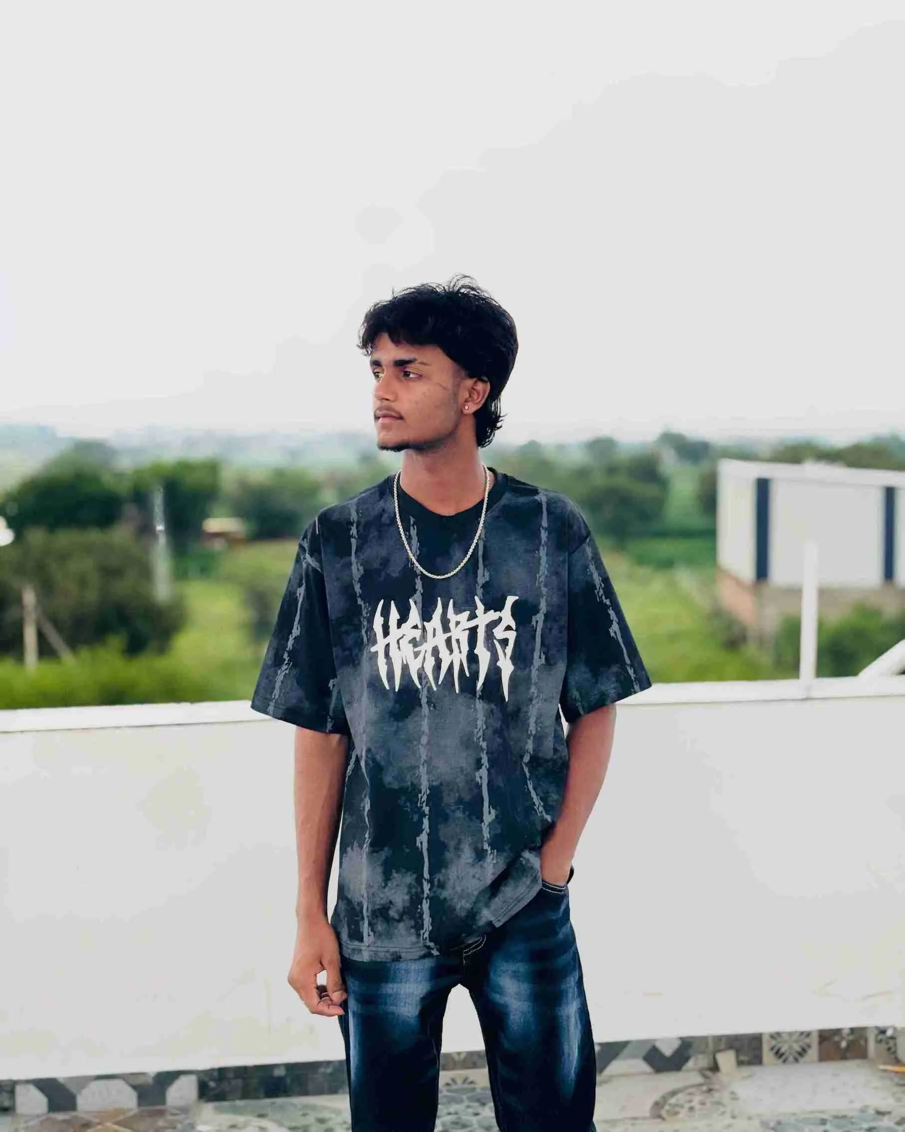 High quality picture of Rayeen posing dynamically in stylish clothes