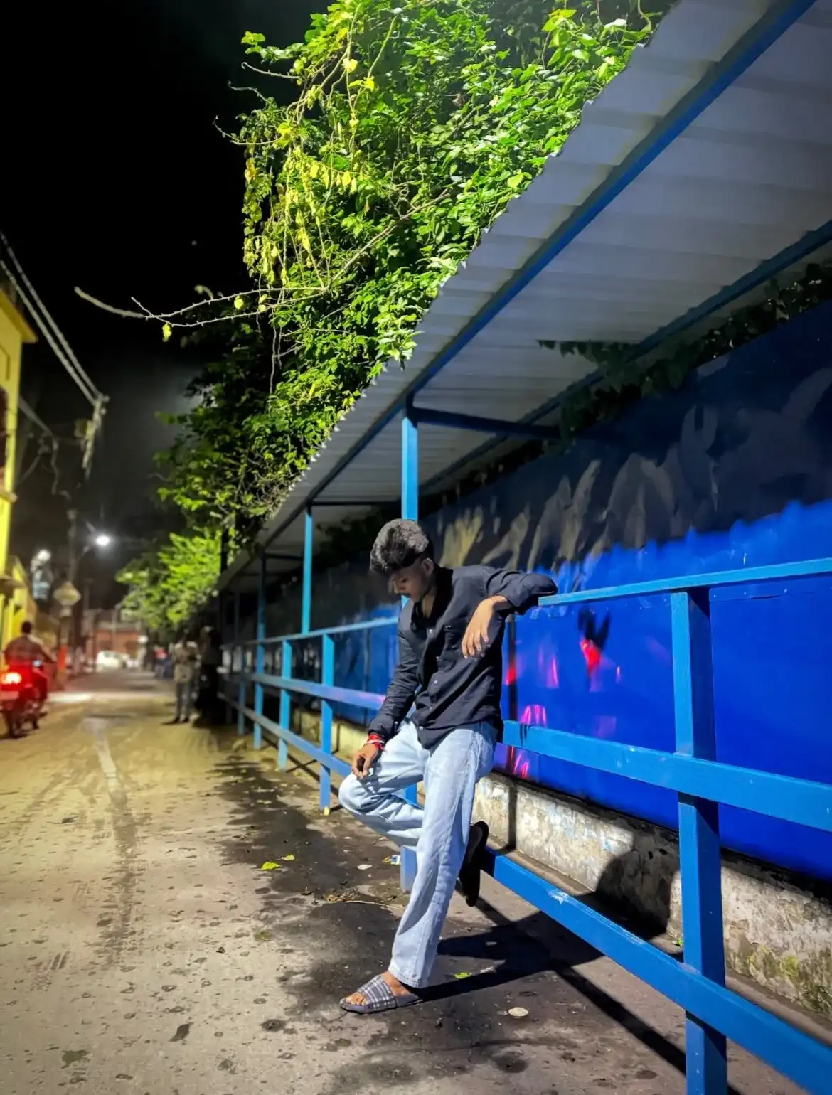 Subham posing in an urban setting