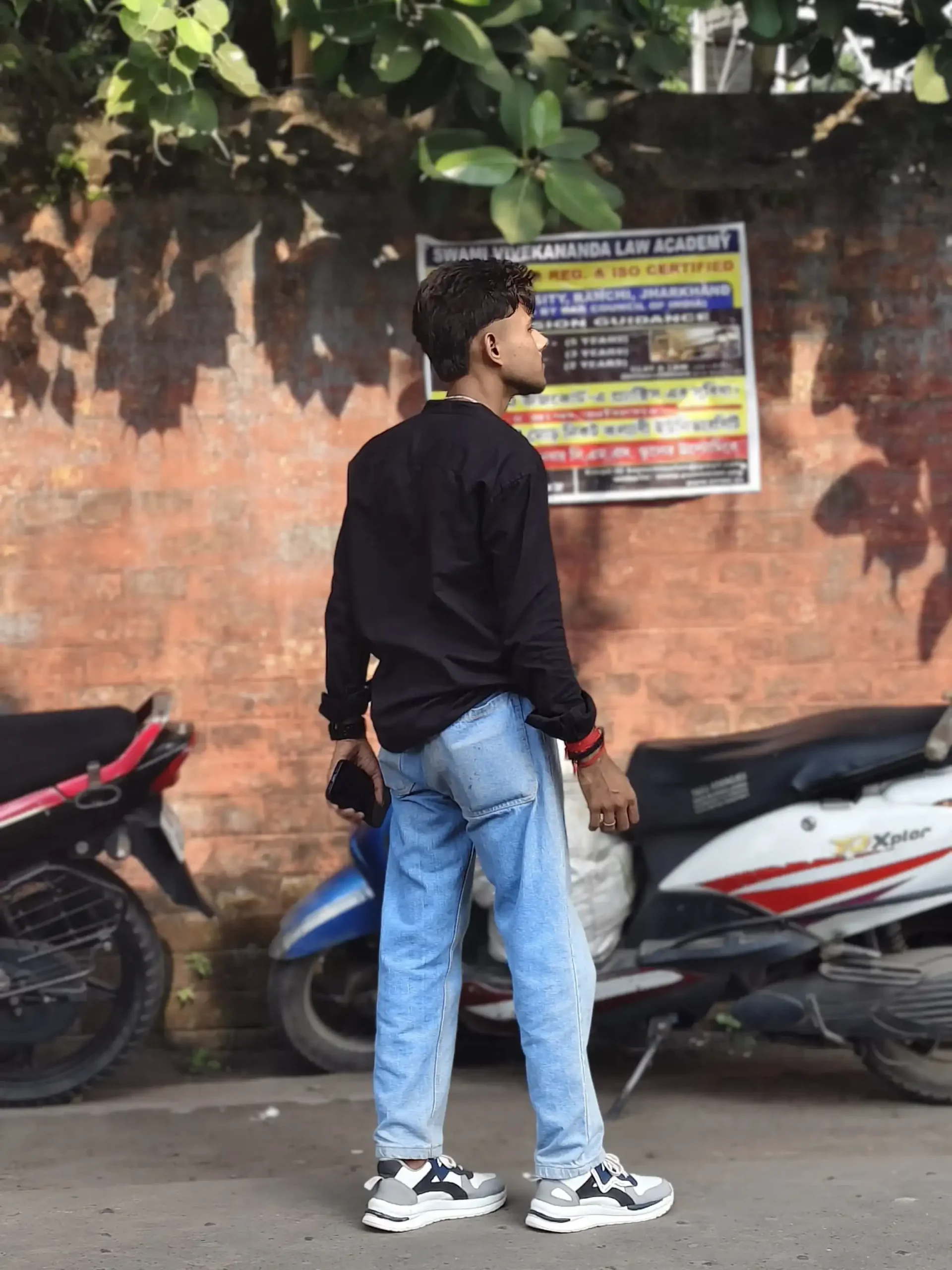 Subham posing in a natural outdoor setting